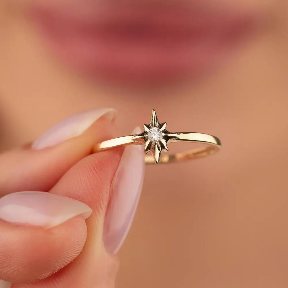 14K North Star Gold Ring Dainty Eight-Point Starburst Design with Sparkling Center Stone