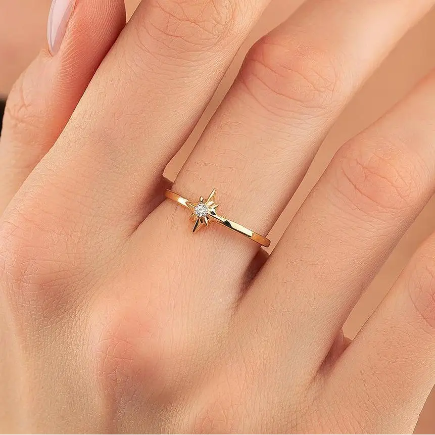 14K North Star Gold Ring Dainty Eight-Point Starburst Design with Sparkling Center Stone