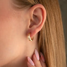 Here’s greek key earrings hoops huggie earring 14K solid gold. As a wide infinity greek key symbol huggy hoop earrings adding sophistication and sparkle to any outfit. The infinity key earring is  ideal for stacking or wearing alone. Discover the luxury of our greek pattern gold and large hoop earrings gift for her birthday or anniversary ceremony. If you re looking for 14k solid gold hoop and everyday wear hoops, here is the wide greek hoops and meander earrings for yourself.