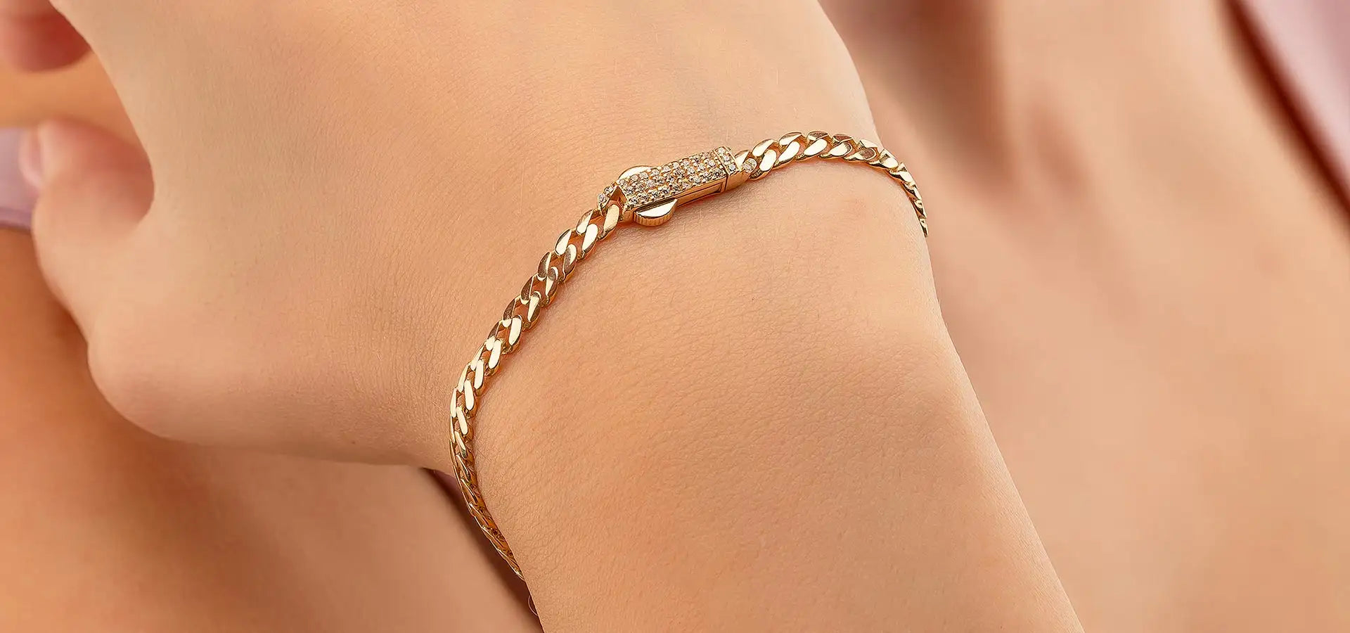Gold braided bracelet with a lobster clasp.